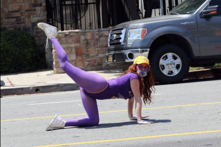 Fitness Freak Phoebe Price Spotted Stretching In The Middle Of The Road
