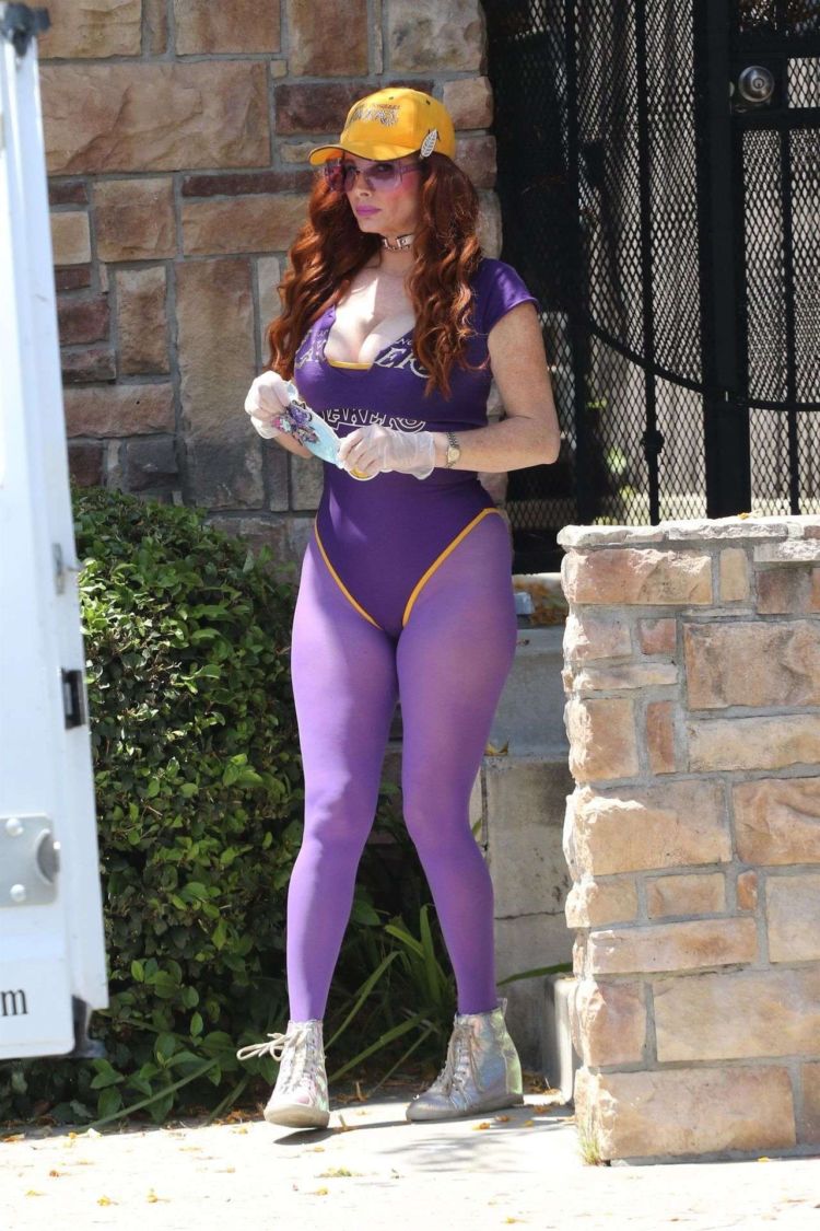 Fitness Freak Phoebe Price Spotted Stretching In The Middle Of The Road