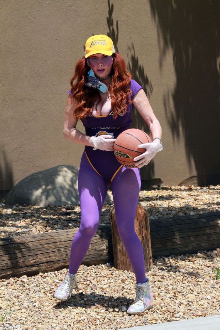 Fitness Freak Phoebe Price Spotted Stretching In The Middle Of The Road