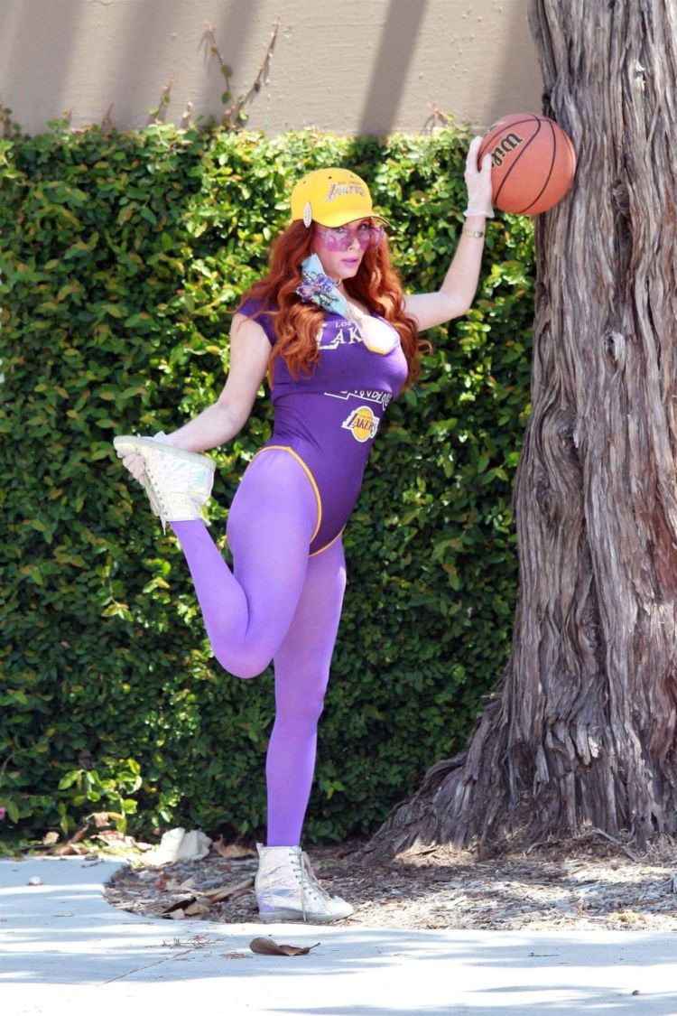 Fitness Freak Phoebe Price Spotted Stretching In The Middle Of The Road