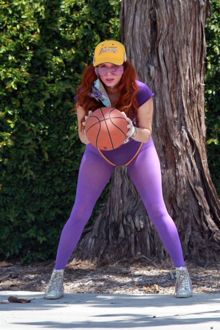 Fitness Freak Phoebe Price Spotted Stretching In The Middle Of The Road