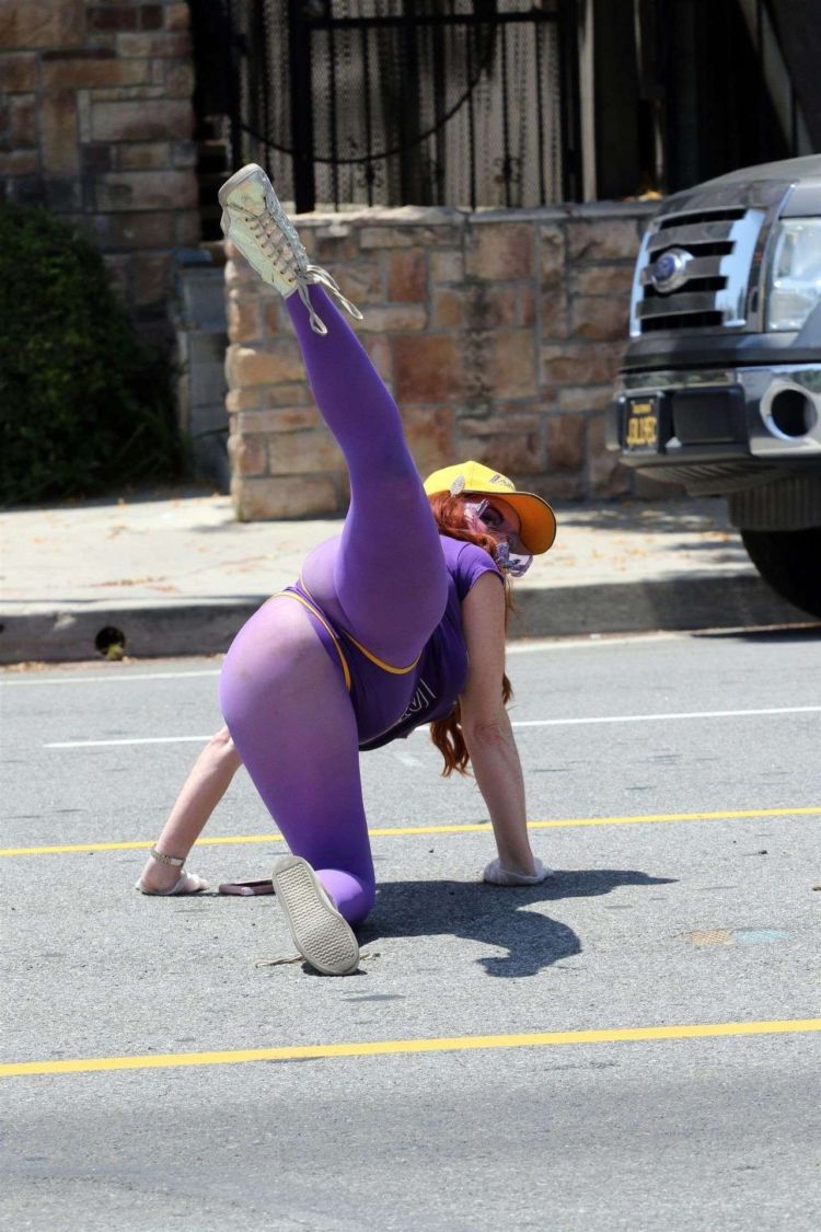 Fitness Freak Phoebe Price Spotted Stretching In The Middle Of The Road