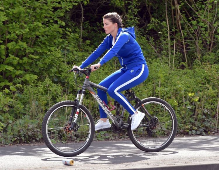 Fitness Freak Phoebe Price Spotted Stretching In The Middle Of The Road