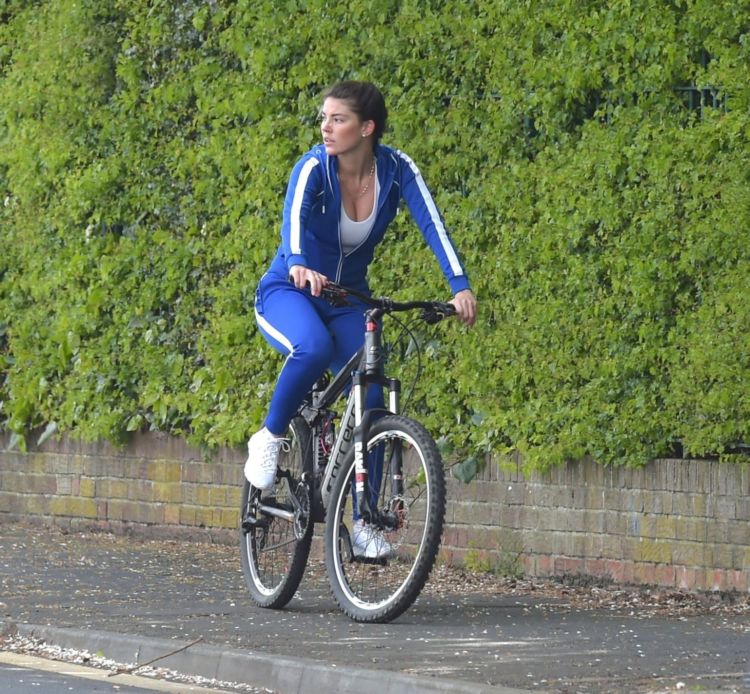 Fitness Freak Phoebe Price Spotted Stretching In The Middle Of The Road