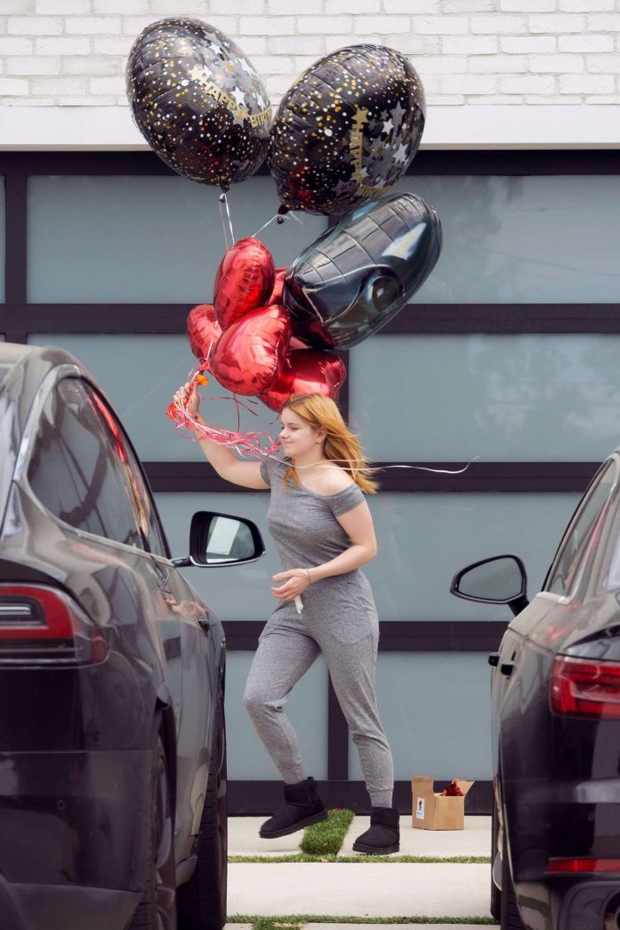 Ariel Winter Taking Balloons For Luke Benward's 25th Birthday
