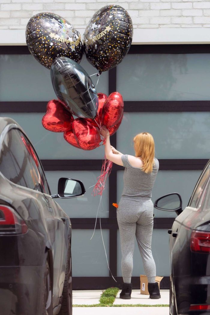 Ariel Winter Taking Balloons For Luke Benward's 25th Birthday