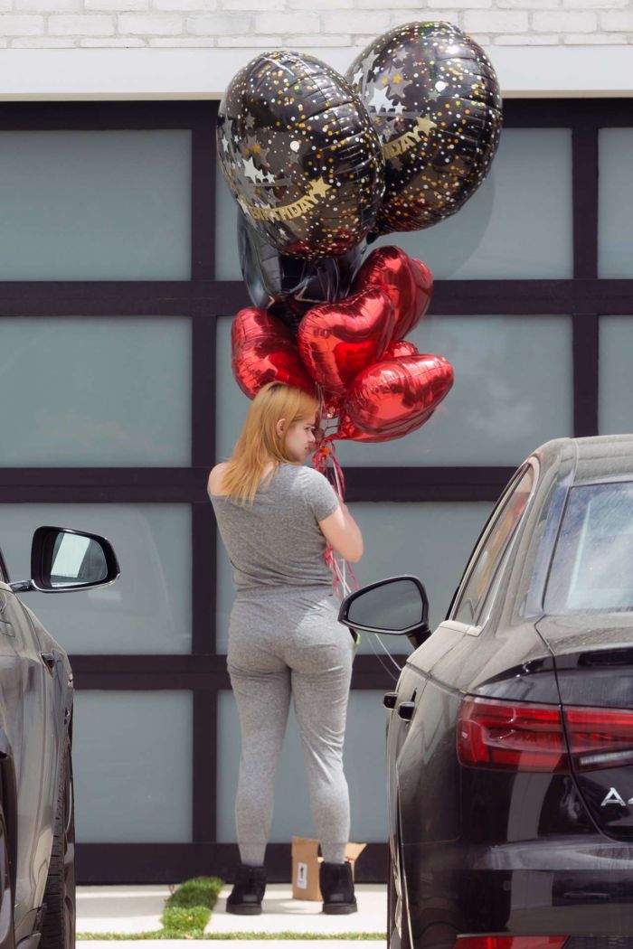 Ariel Winter Taking Balloons For Luke Benward's 25th Birthday
