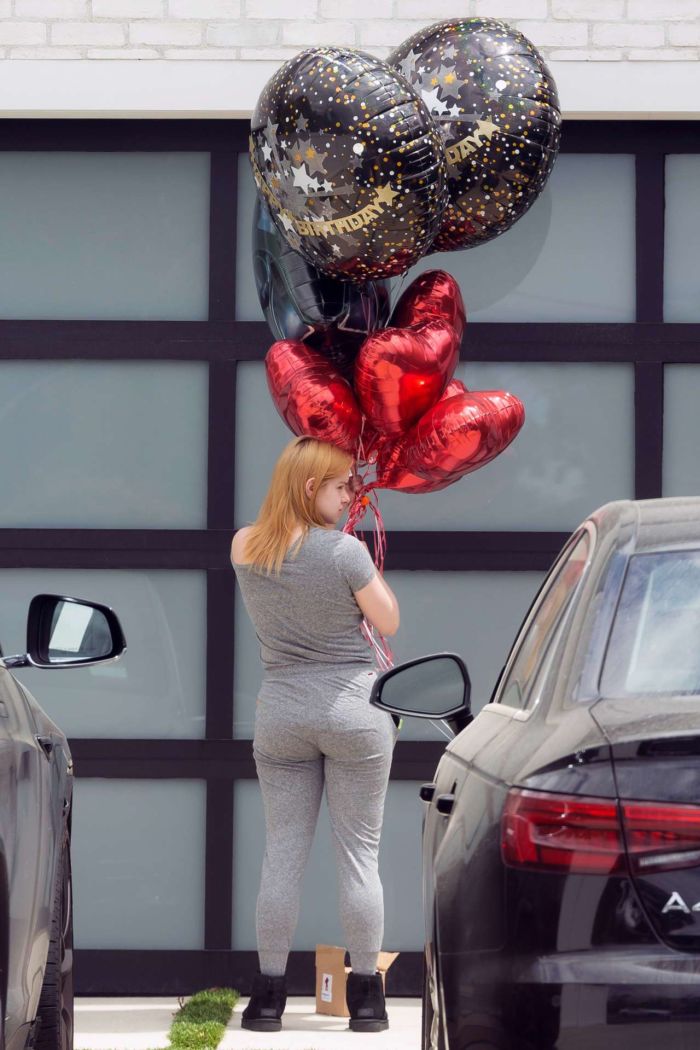 Ariel Winter Taking Balloons For Luke Benward's 25th Birthday