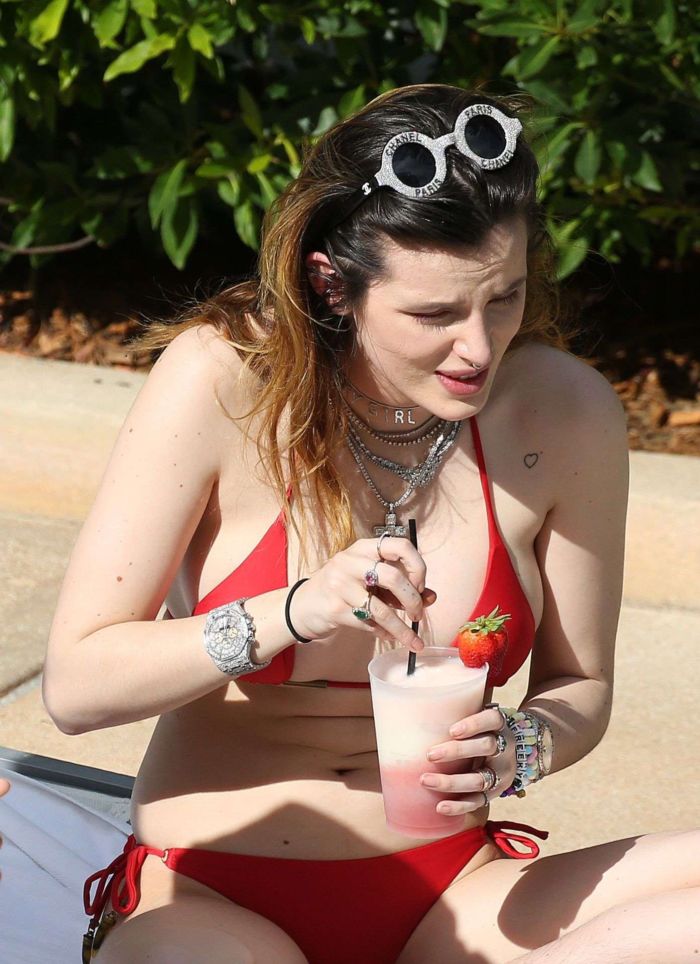 Bella Thorne In A Red Bikini At A Swimming Pool In Miami