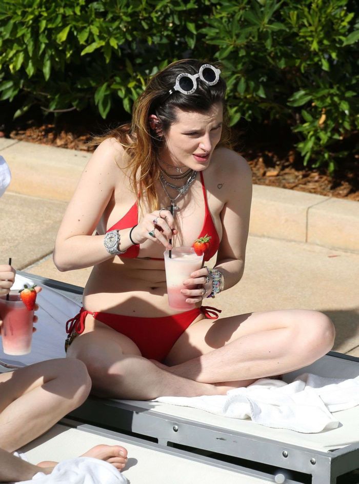 Bella Thorne In A Red Bikini At A Swimming Pool In Miami