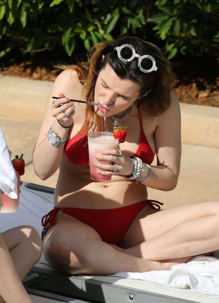 Bella Thorne In A Red Bikini At A Swimming Pool In Miami