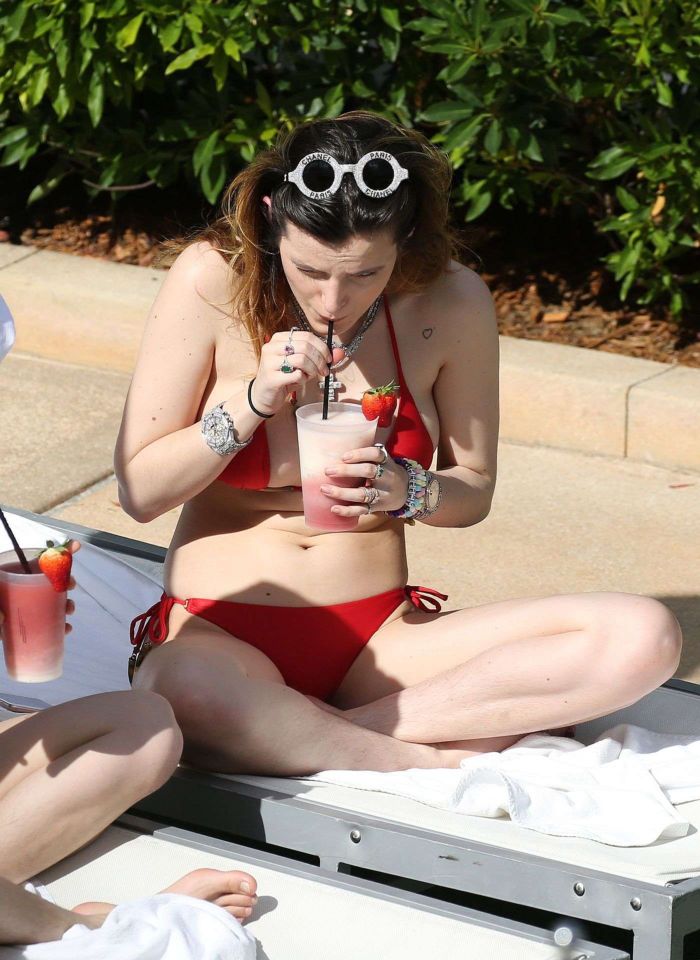 Bella Thorne In A Red Bikini At A Swimming Pool In Miami