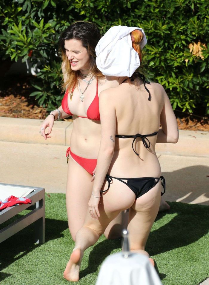 Bella Thorne In A Red Bikini At A Swimming Pool In Miami