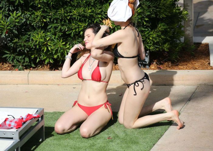 Bella Thorne In A Red Bikini At A Swimming Pool In Miami