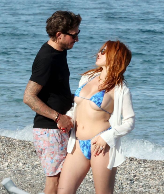 Bella Thorne Vacationing In A Bikini On The Beach In Taormina