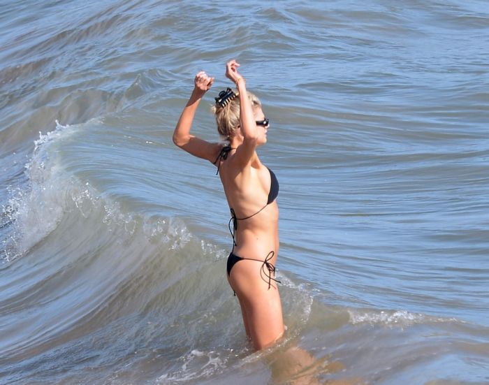 Charlotte McKinney Makes A Splash In Black Bikini On The Beach