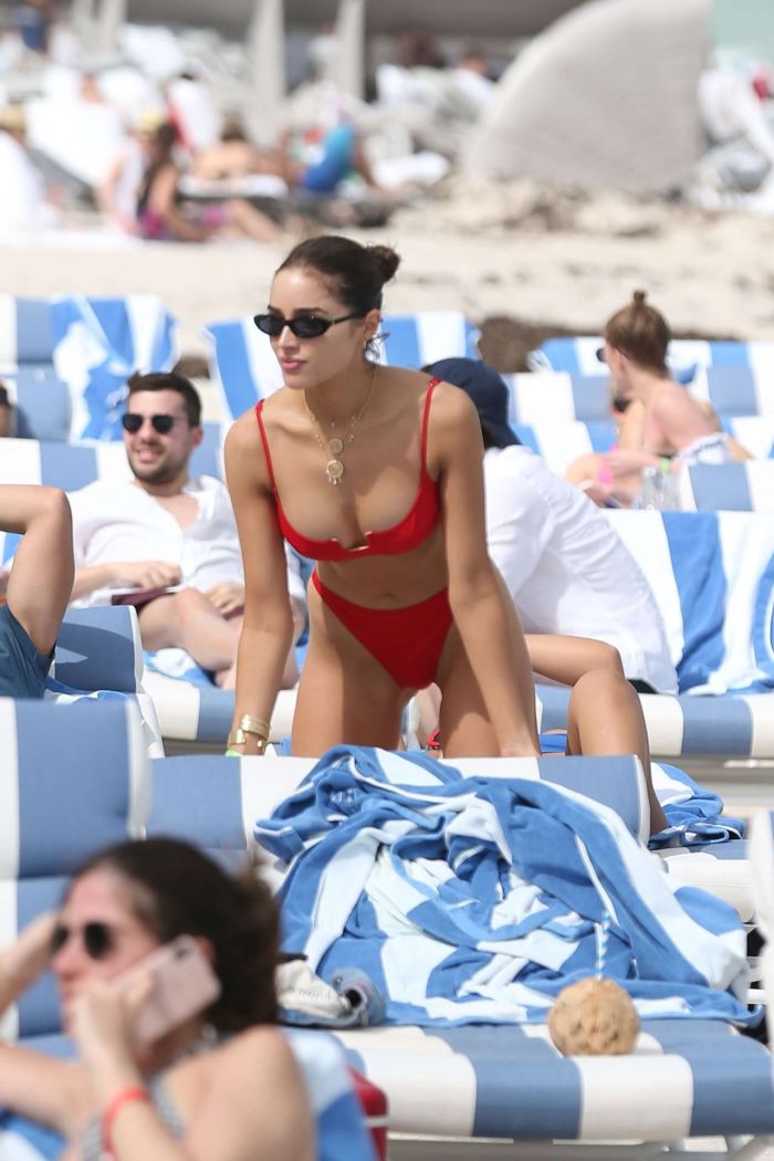 Olivia Culpo Relaxing In A Red Swimwear On The Miami Beach