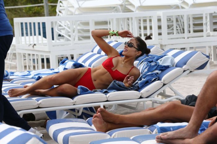 Olivia Culpo Relaxing In A Red Swimwear On The Miami Beach