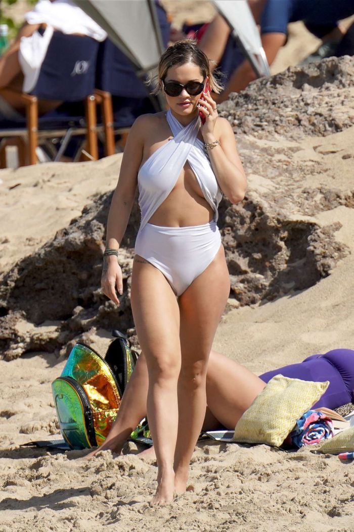 Rita Ora Vacationing In A White Swimsuit On The Beach In Saint Barthelemy