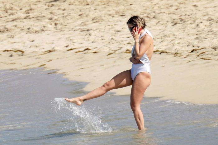 Rita Ora Vacationing In A White Swimsuit On The Beach In Saint Barthelemy