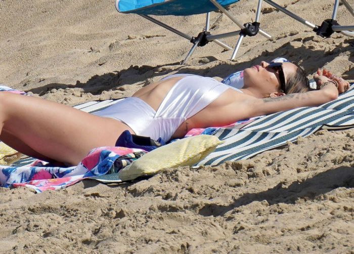 Rita Ora Vacationing In A White Swimsuit On The Beach In Saint Barthelemy