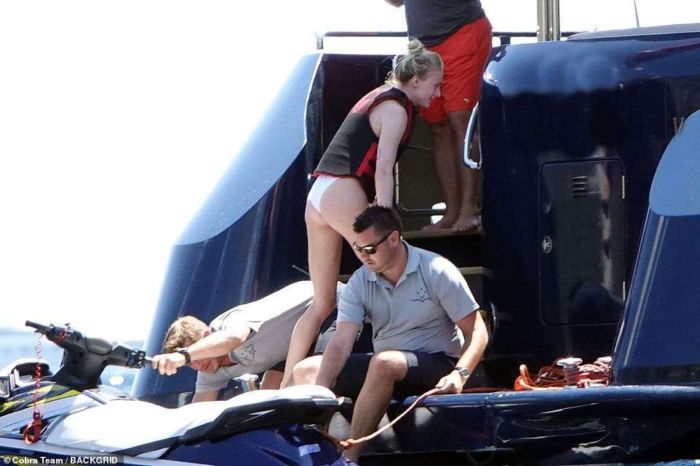 Sophie Turner In A White Swimsuit On A Yacht In Italy