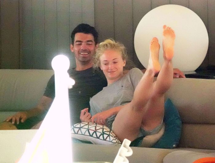 Sophie Turner In A White Swimsuit On A Yacht In Italy