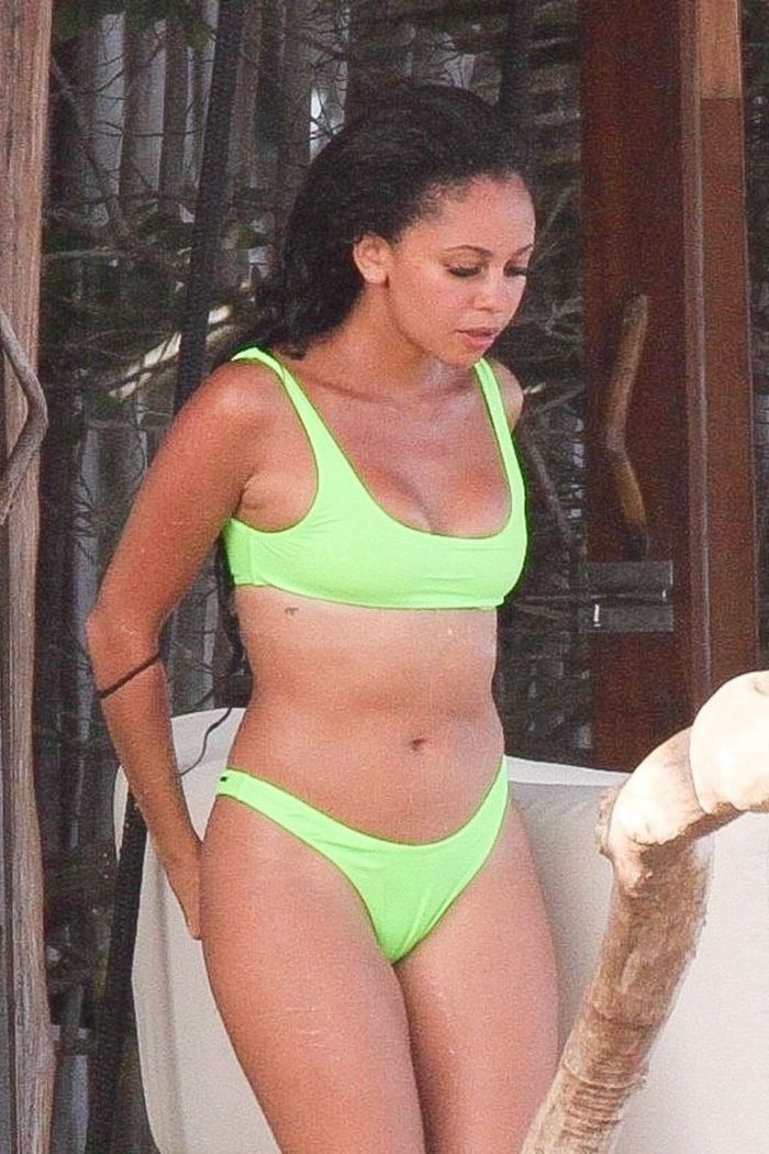 Vanessa Morgan Candids In A Yellow Bikini In Tulum