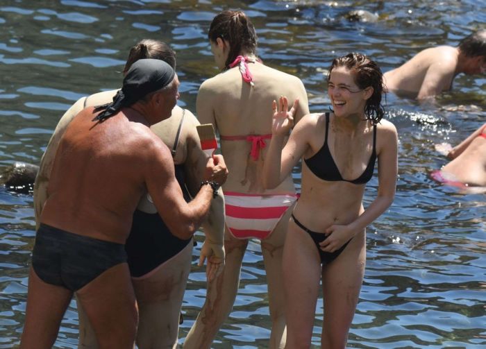 Zoey Deutch With Friends In A Black Bikini In Ischia, Italy