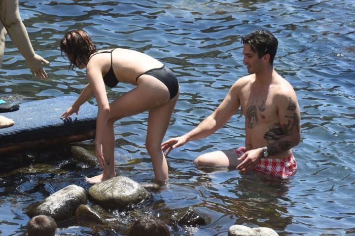 Zoey Deutch With Friends In A Black Bikini In Ischia, Italy