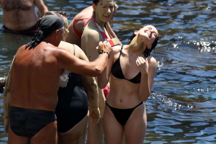 Zoey Deutch With Friends In A Black Bikini In Ischia, Italy